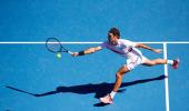 Nocturnal Federer makes light of day shift