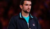 Cilic blames closed roof for slow start against Federer