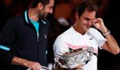 Weeping Federer hails 20th Grand Slam title