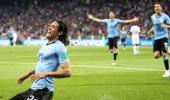 World Cup PIX: Brilliant Cavani brace earns Uruguay win over Portugal