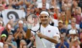 Wimbledon PHOTOS: Federer marches on; Venus, Keys crash out