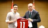 German soccer star Ozil defends photo with Erdogan