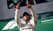 Hamilton wins in Hungary to stretch F1 title lead