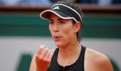 Muguruza has her 'game face' on, smiles can wait