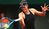 French Open PIX: Muguruza thrashes Sharapova, Halep powers past Kerber