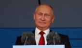 Defiant Putin welcomes World Cup as Russia win