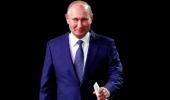 President Putin revels in Russia's unexpected World Cup form