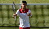 Djokovic says not among favourites at Wimbledon, backs Federer