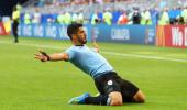 FIFA WC PIX: Uruguay thrash 10-man Russia 3-0 to lead Group A