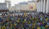 PHOTOS: Brazilian fans bring carnival to Moscow square