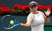 American teen Anisimova stuns Wang, Tomic crashes out