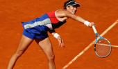 From red carpet to red dirt, Muguruza the warrior