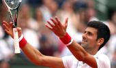 French Open PHOTOS: Azarenka, Wawrinka crash out; Djokovic through