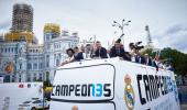 PHOTOS: Champions Real Madrid paint the town white during parade