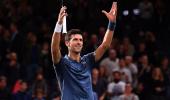 Djokovic marks return to world number one with easy win