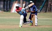 PHOTOS: India's hockey legend tries his hand at cricket...