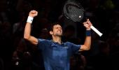 Djokovic outlasts Federer to set up Khachanov final