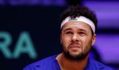 Tsonga defies doctor to battle on, but all in vain