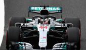 Hamilton storms to 80th pole in Japan, Vettel ninth