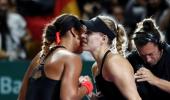 Kerber overcomes Osaka in Singapore classic