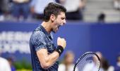 PIX: 57 rallies, high humidity -- Djokovic ground by Millman before win