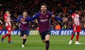 PICS: Suarez, Messi sink Atletico after Costa sees red