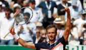 Djokovic falls to Medvedev, Nadal marches on