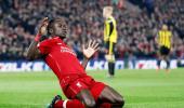 EPL PHOTOS: Liverpool, City march on as Spurs slip again