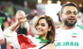 PHOTOS: Fans turn up the buzz at Asian Cup football!