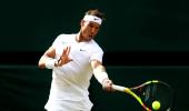 Wimbledon PIX: Federer, Rafa advance; Kerber out