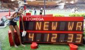 Hassan breaks women's mile world record; Gatlin fastest