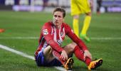 Soccer Extras: Spain striker Torres retires