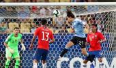 PIX: Cavani goal gives Uruguay top spot