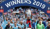 Manchester City crush Watford to complete treble in style