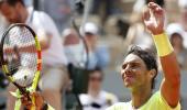 French Open PIX: Nadal, Djokovic advance; Wozniacki out