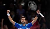 ATP Finals PIX: Federer stunned; Djokovic wins opener