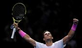 Nadal battles from brink to beat Medvedev