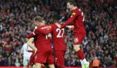 EPL PIX: Milner keeps Liverpool flying; Spurs crash