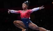 Biles rewrites history as US romp to fifth World title