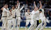 Australia overcome stubborn England to retain Ashes