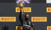 F1 PIX: Hamilton wins British GP with punctured tyre