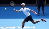 Djokovic crosses fingers for clean air in Melbourne