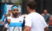 Indians at Aus Open: Divij advances, Bopanna ousted