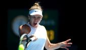 Frustrated Halep happy to advance in Melbourne