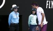 Federer fined $3,000 for swearing at Australian Open