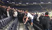 Tottenham's Dier jumps into stands to fight a fan