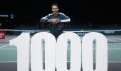 Nadal survives scare in Paris to claim 1,000th win