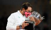 Nadal continues Paris reign with record-equalling Slam