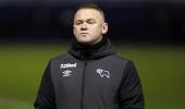 Rooney ends playing career to become Derby manager