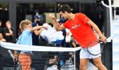 Out then in, Djokovic plays a set in Adelaide